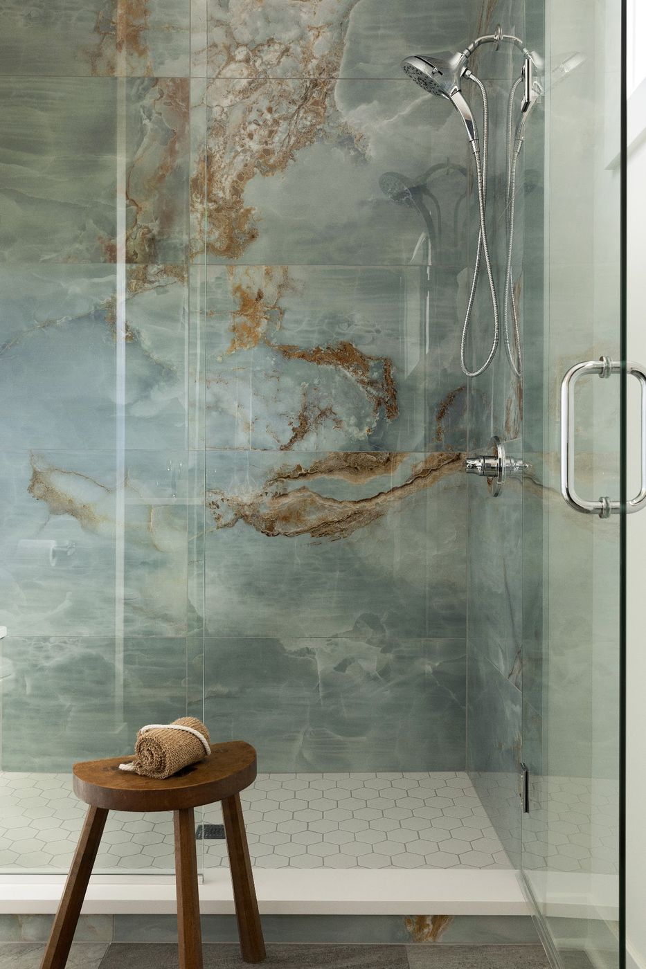Shower with large blue onyx-look slab walls and a wood stool